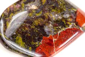 Macro mineral stone jasper on a white background photo