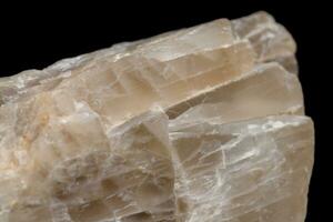 Macro mineral stone Moonstone a black background photo