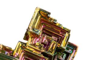 Macro of the mineral bismuth stone on a white background photo