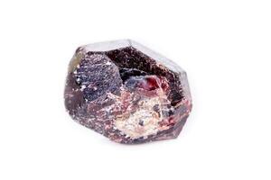 Macro of a mineral garnet stone on a white background photo