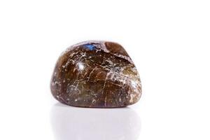 Macro mineral stone Labradorite on white background photo