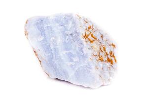 Macro mineral blue agate in the rock on white background photo