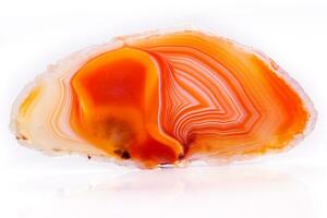 Macro mineral orange agate in crystals on white background photo