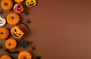 Happy Halloween banner or party invitation background with clouds bats and pumpkins photos