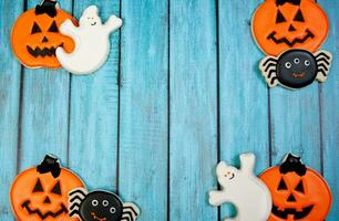 Happy Halloween banner or party invitation background with clouds bats and pumpkins photos
