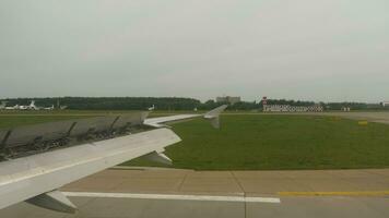 The plane takes off. First person view from the airplane window video