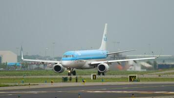 AMSTERDAM, THE NETHERLANDS JULY 25, 2017 - KLM Cityhopper Embraer 190 taxiing before departure at runway 36L Polderbaan. Schiphol Airport, Amsterdam, Holland video