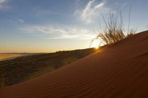 puesta de sol a elim dunas cerca sossusvlei foto