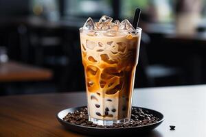 Iced Coffee Latte with Fresh Milk Mixed Served in a Clear Glass in Cafe photo
