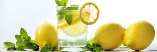 Lemonade in a glass with fresh lemons and mint. Cold summer drink with copy space. Generative AI photo