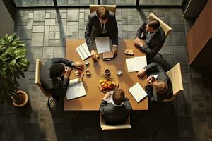 Top view of business people sitting at table and working together in office, Business meeting on a working table, top view, No visible faces, AI Generated photo