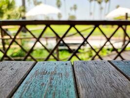 brown and blue wooden plank fence natural view background with copy space photo