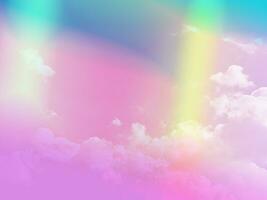 beauty sweet pastel soft yellow and pink with fluffy clouds on sky. multi color rainbow image. abstract fantasy growing light photo