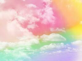 beauty sweet pastel red orange colorful with fluffy clouds on sky. multi color rainbow image. abstract fantasy growing light photo