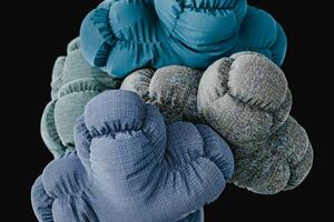 soft bodies with fabric textures collapsing in black background . 3d render photo