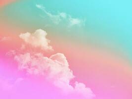 beauty sweet pastel soft pink and orange with fluffy clouds on sky. multi color rainbow image. abstract fantasy growing light photo