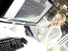 Young girl is choosing the keyboard. photo