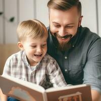 Father and son are reading a book and smiling while spending time together at home photo