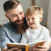 Father and son are reading a book and smiling while spending time together at home photo