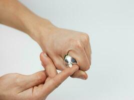 Close up image of hands with cream tube. photo