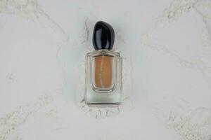 A bottle of perfume on a white background. photo