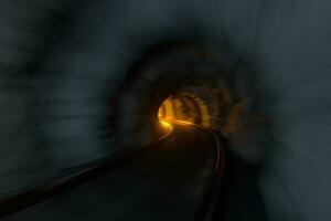 The rail tunnel with light illuminated in the end, 3d rendering. photo