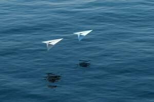 Two paper plane fly over the lake, 3d rendering. photo