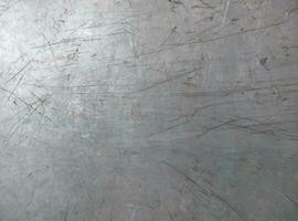 Metal grunge texture background, stained and scratched photo