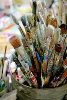 A Collection of Well Used Artist's Paintbrushes photo