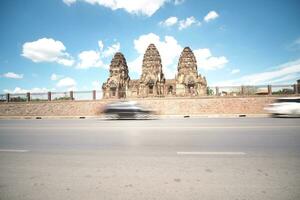 Long exposure of the vehicle in front of the architecture, Thailand. photo