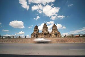 Long exposure of the vehicle in front of the architecture, Thailand. photo