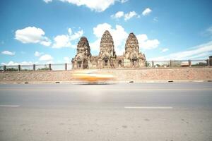 Long exposure of the vehicle in front of the architecture, Thailand. photo