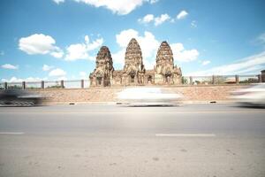 Long exposure of the vehicle in front of the architecture, Thailand. photo