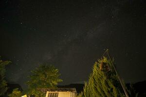 Buildings and the Milky Way in the background. photo