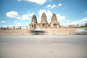 Long exposure of the vehicle in front of the architecture, Thailand. photo