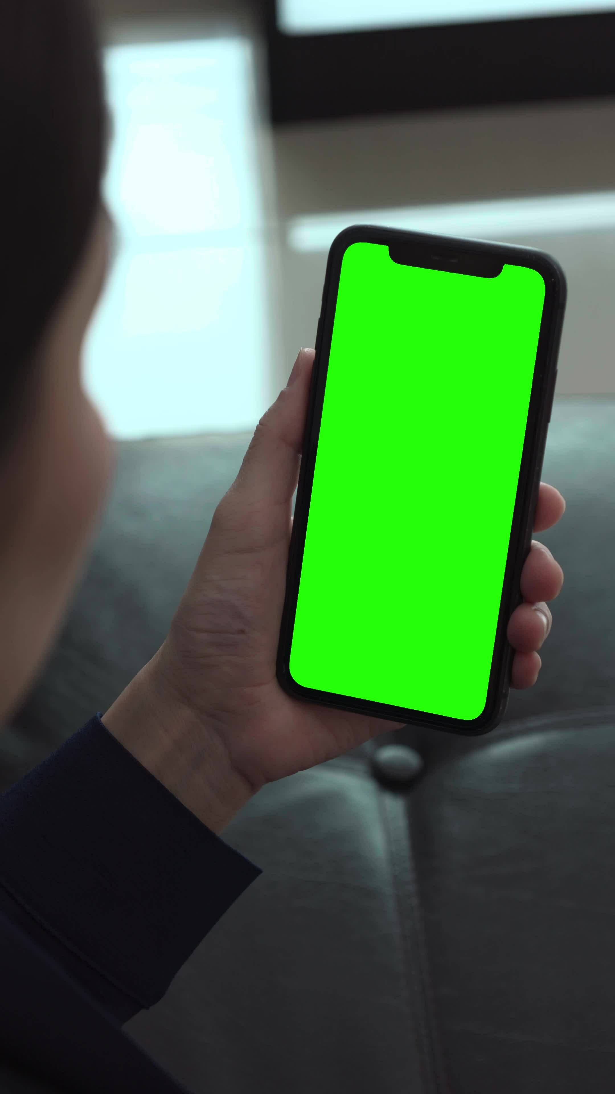Green screen, phone, green screen of phone, woman using mobile phone