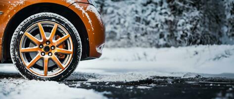 Wheel of a car in snow photo