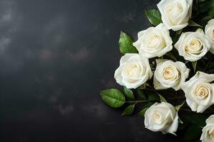 Funeral white roses on dark background with copy space photo