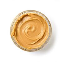 Peanut butter isolated on white background top view photo