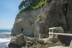 Bridge at Enoshima Iwaya Cave place in the west end of Enoshima Island in Fujisawa, Kanagawa, Japan photo