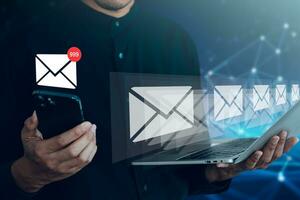 Businessman open the email message from smart phone. Information technology and network concept. photo