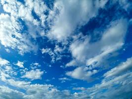 Blue sky and beautiful soft white clouds good weather for background photo