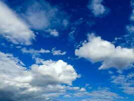 Blue sky and beautiful soft white clouds good weather for background photo