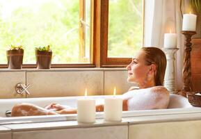 Woman taking bath photo