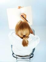 Student girl passing exams photo