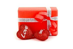 Red romantic gift box with hearts photo