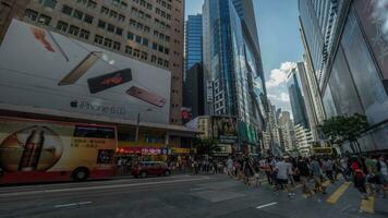 Pedestrians crossing road in Hong Kong photo