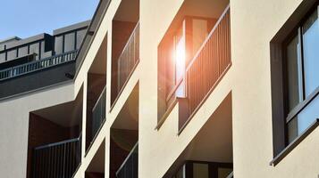 Modern and new apartment building. Multistoried modern, new and stylish living block of flats. photo