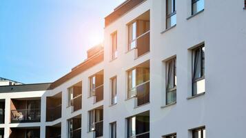 Modern and new apartment building. Multistoried modern, new and stylish living block of flats. photo