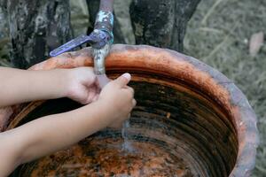 Children's hands. Wash your hands to prevent germs. photo